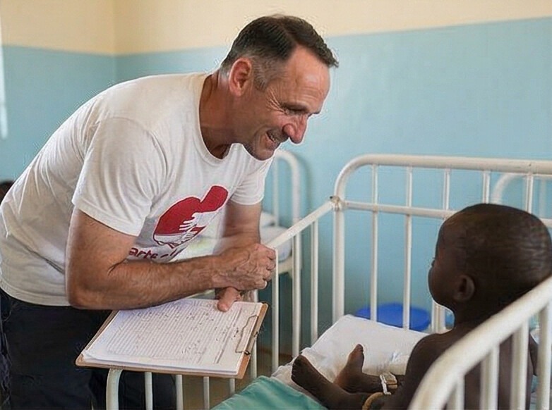 Hearts of Africa volunteer visiting a child in hospital